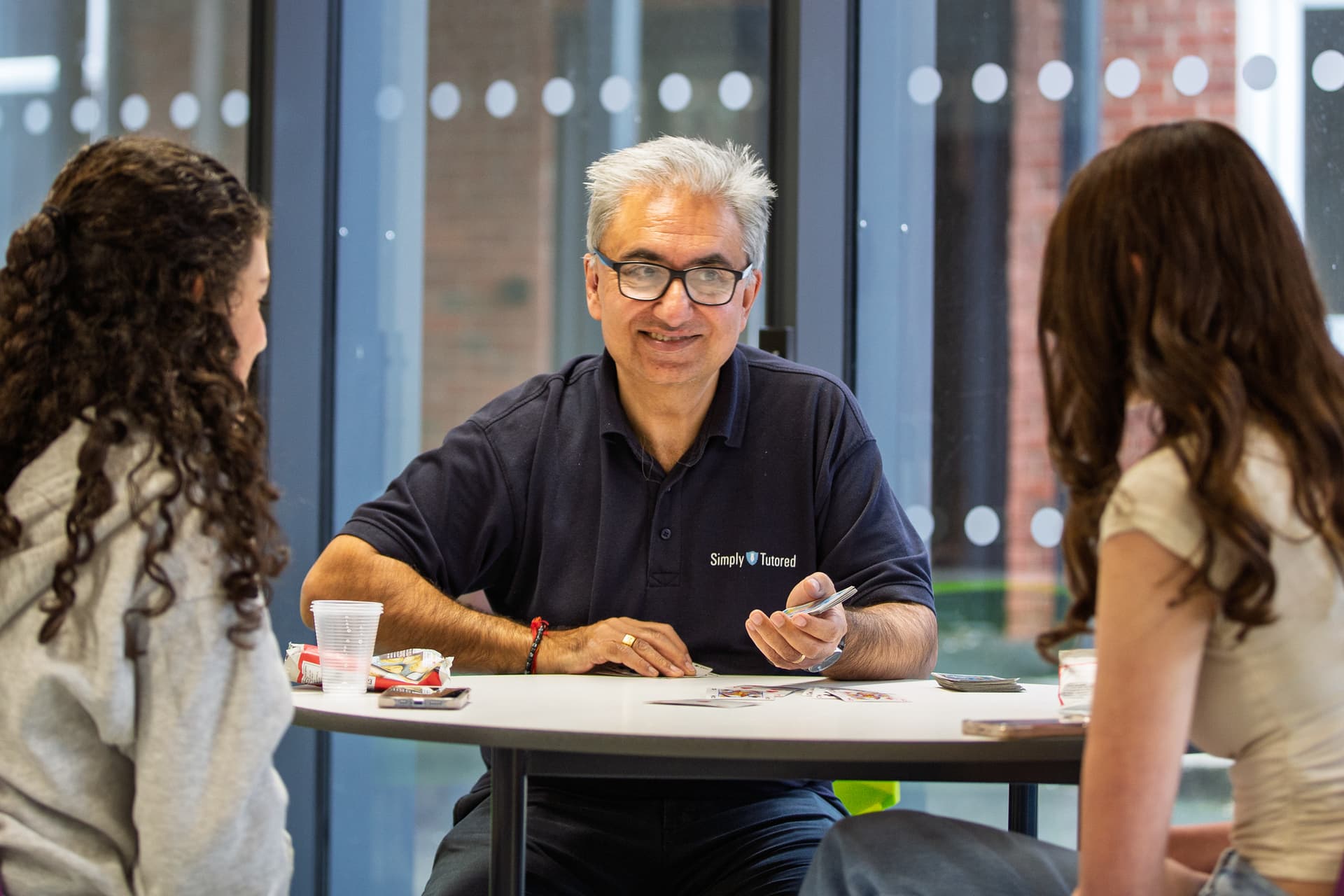Tutor working one-to-one with student